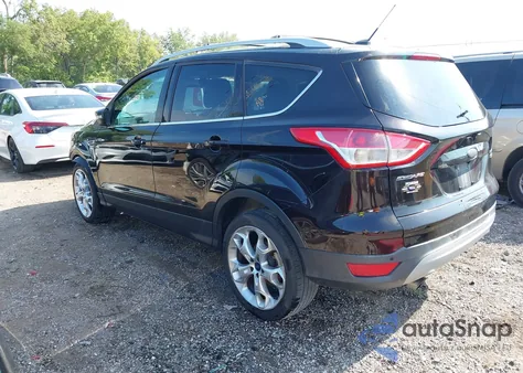 2013 Ford Escape Titanium z USA, uszkodzony, nr VIN 1FMCU0J93DUD65586